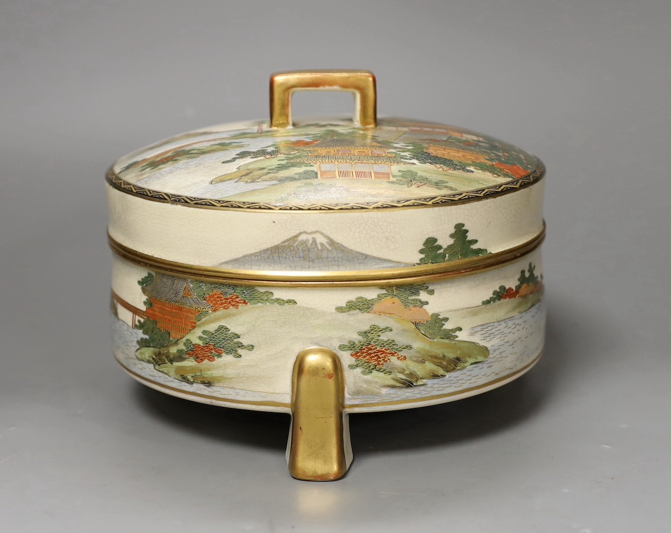 An early 20th century Japanese Satsuma circular box and cover, 18.5cm
